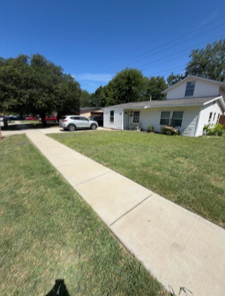 Freshly mowed striped lawn at a DFW home