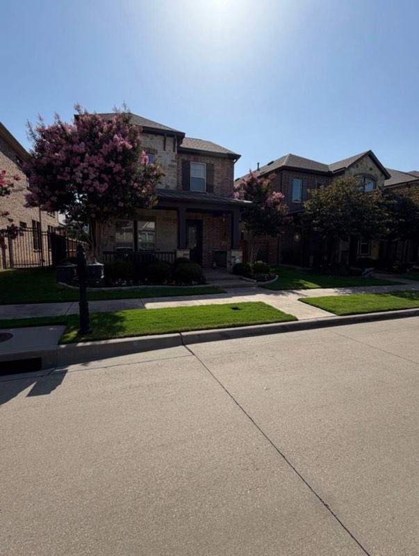 Well-kept lawn at an upscale DFW brick home